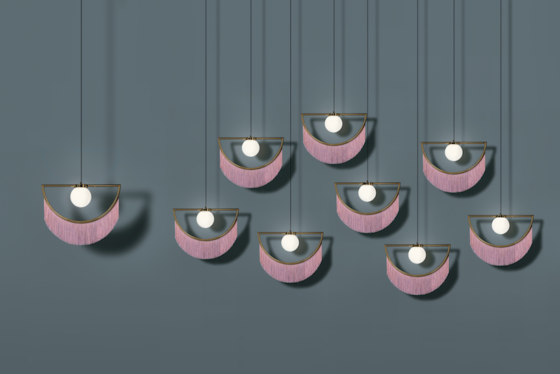 houtique + masquespacio's wink lamps feature carefully crafted pink fringes
