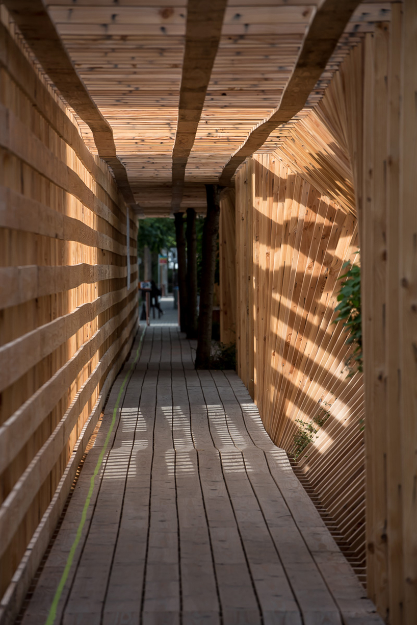 atelier vecteur carves an oscillating timber tunnel through nantes, france