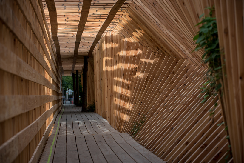 atelier vecteur carves an oscillating timber tunnel through nantes, france
