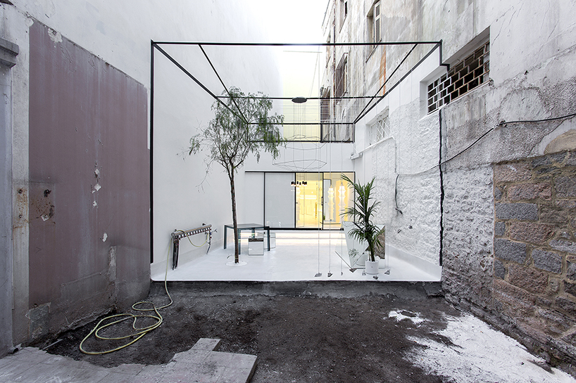 314 architecture designs optimist eyewear store in greece