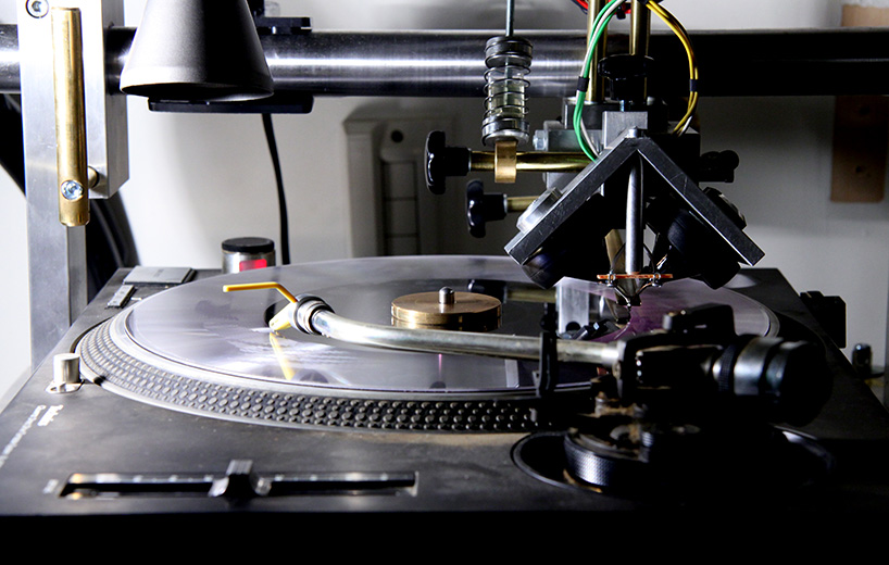 cutting graphics onto vinyl records by shinsuke yamaji