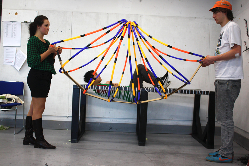 vertice   a cradle like steel cage chaise longue