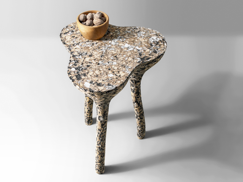 donatas Žukauskas breathes new life into paper & cardboard for mottled tripod side table