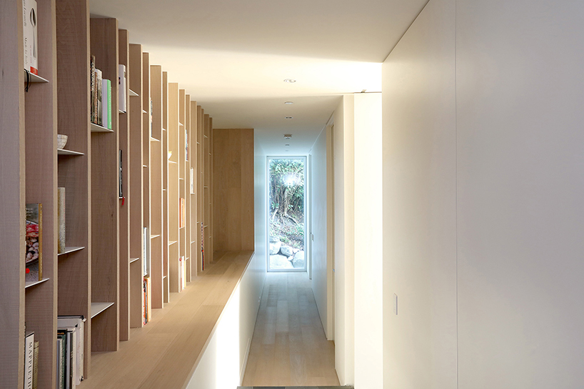 mcleod bovell wraps west vancouver residence in wood to resemble a beach house