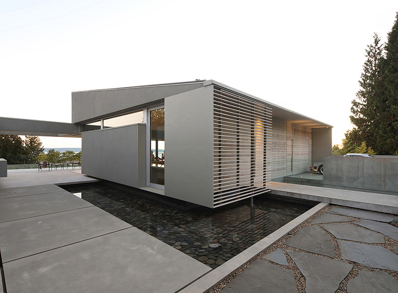 mcleod bovell wraps west vancouver residence in wood to resemble a beach house