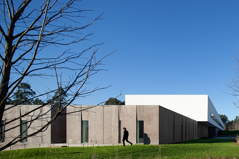 pedro reis floats horizontal white volume on melgaco sports school