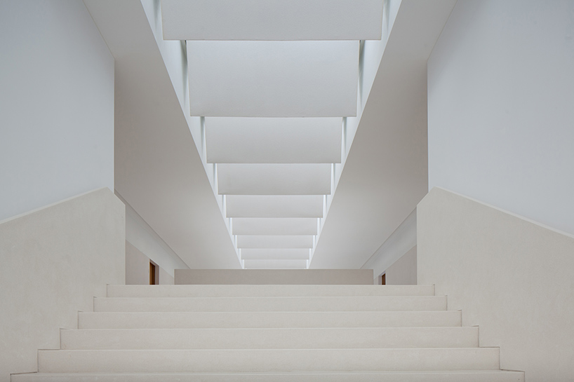 pedro reis floats horizontal white volume on melgaco sports school