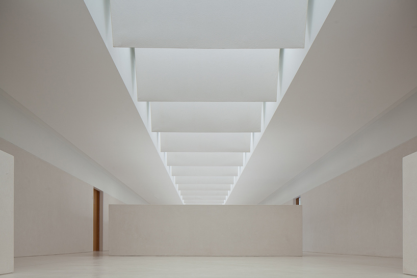 pedro reis floats horizontal white volume on melgaco sports school