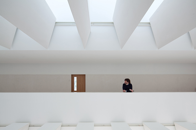 pedro reis floats horizontal white volume on melgaco sports school