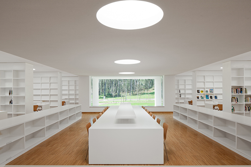 pedro reis floats horizontal white volume on melgaco sports school