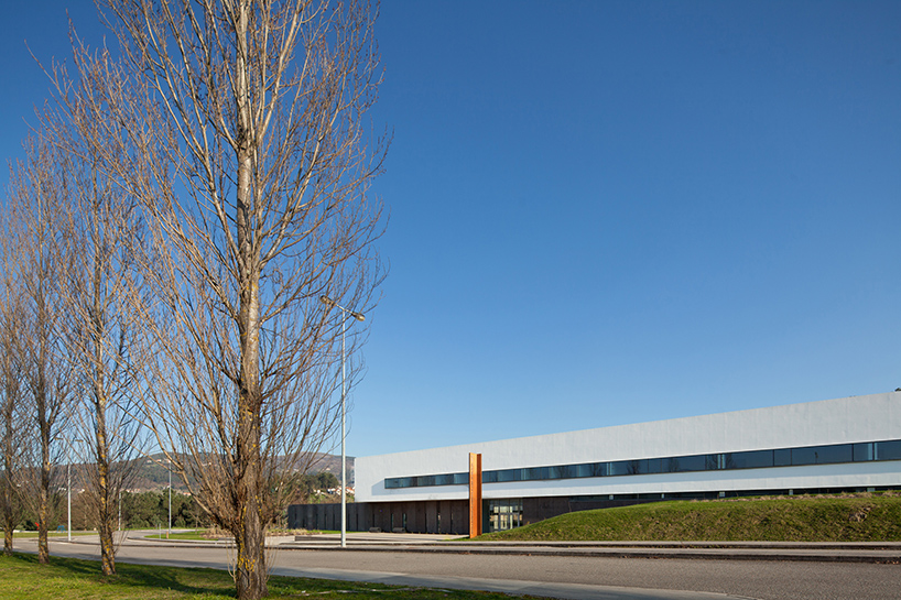 pedro reis floats horizontal white volume on melgaco sports school