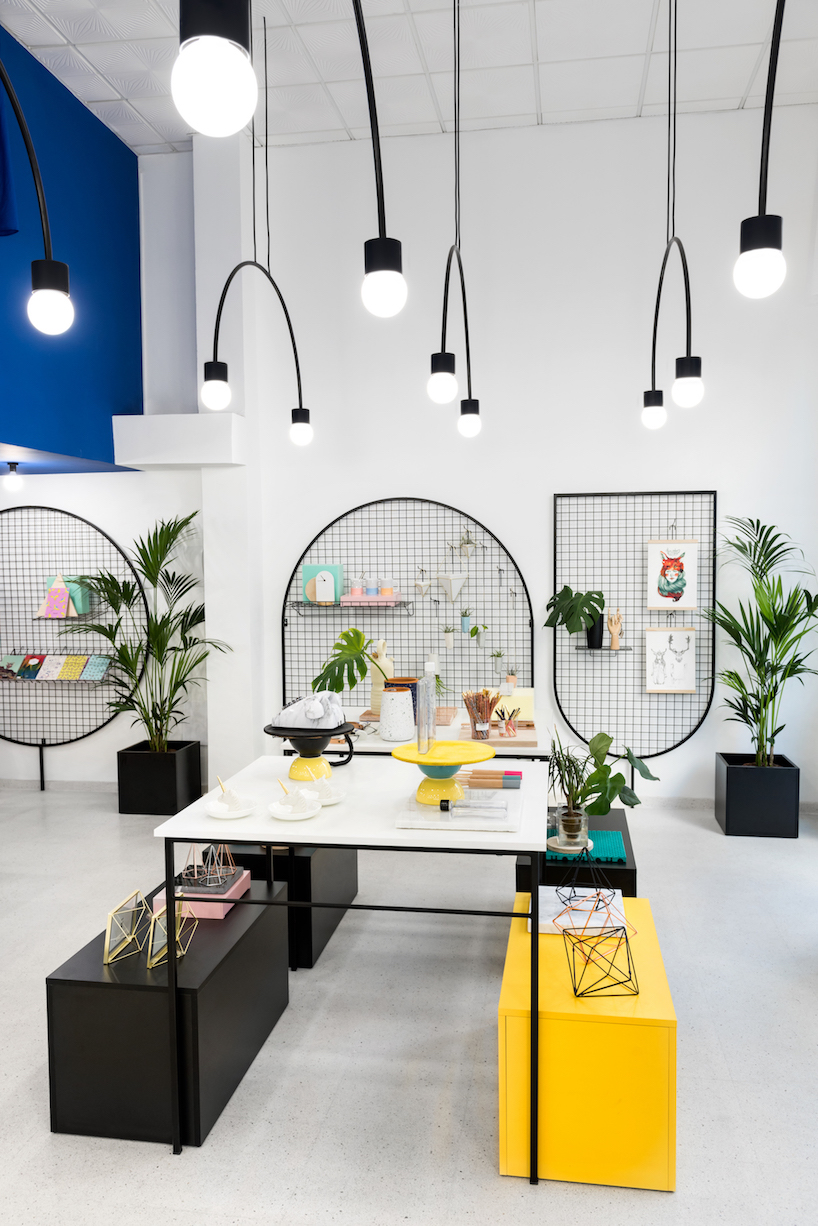 masquespacio paints valencia lifestyle store with block colors + bold lines