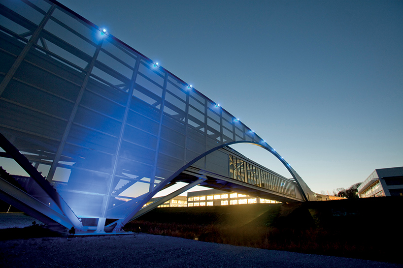 illuminated footbridge at the volkswagen production facility by SSOE group