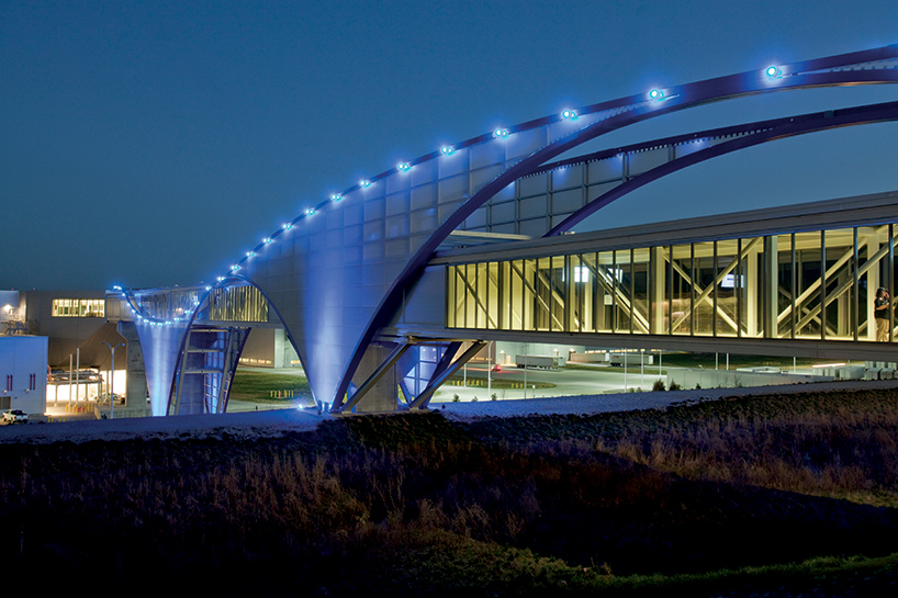 illuminated footbridge at the volkswagen production facility by SSOE group
