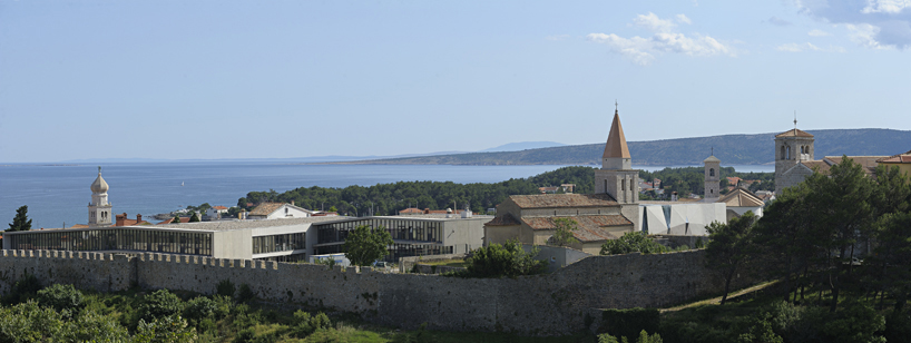 idis turato overlaps old and new with krk sports hall + square