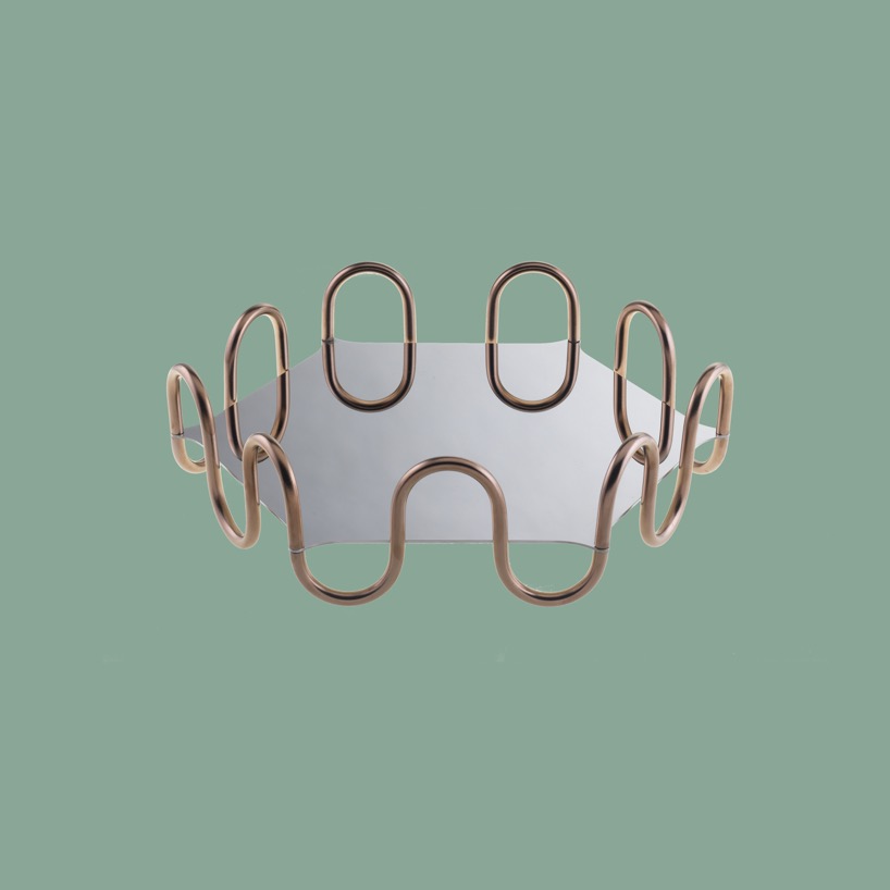 serena confalonieri's kyma collection for sambonet ripples like waves
