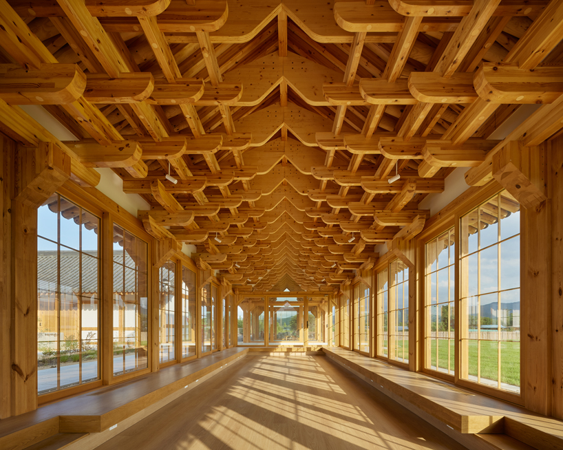 three timber rejuvenation halls by JK-AR surround a series of traditional korean courtyards - 8