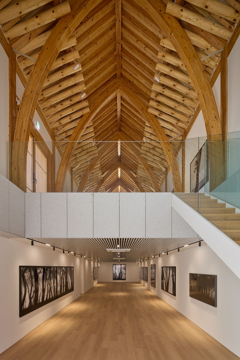 three timber rejuvenation halls by JK-AR surround a series of traditional korean courtyards - 10