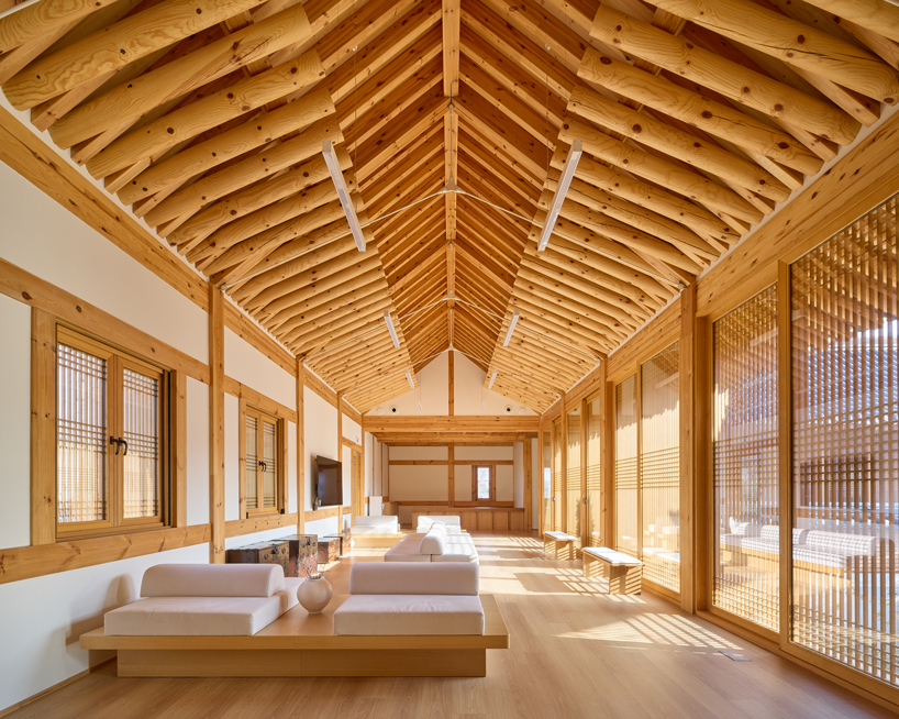 three timber rejuvenation halls by JK-AR surround a series of traditional korean courtyards - 11