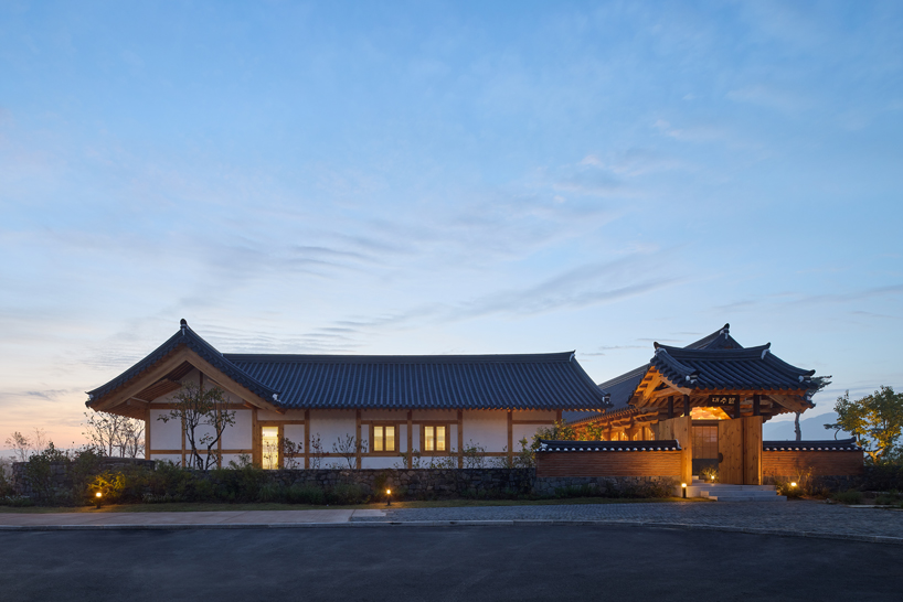 three timber rejuvenation halls by JK-AR surround a series of traditional korean courtyards - 12