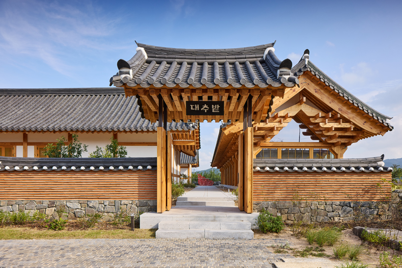 three timber rejuvenation halls by JK-AR surround a series of traditional korean courtyards - 4