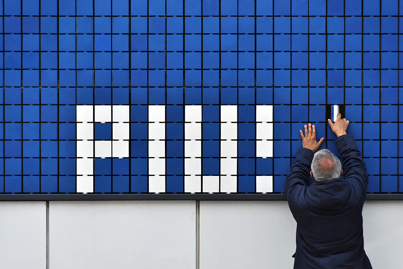 flip-it by moradavaga is an interactive pixel-like mural for portuguese street theatre festival