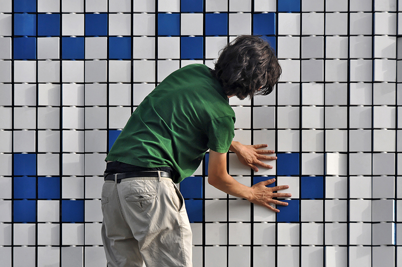 flip-it by moradavaga is an interactive pixel-like mural for portuguese street theatre festival
