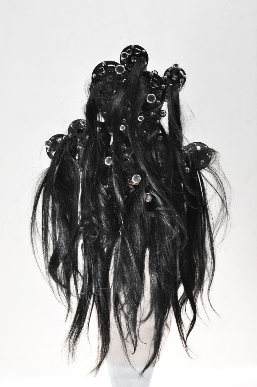 Kinetic Machine With Hair Caught In It Explores The Chaos And