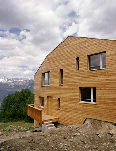 wooden house on the slope by lx1 architects