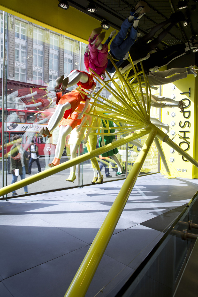 NEON architects: riba colour mannequin wheel installation