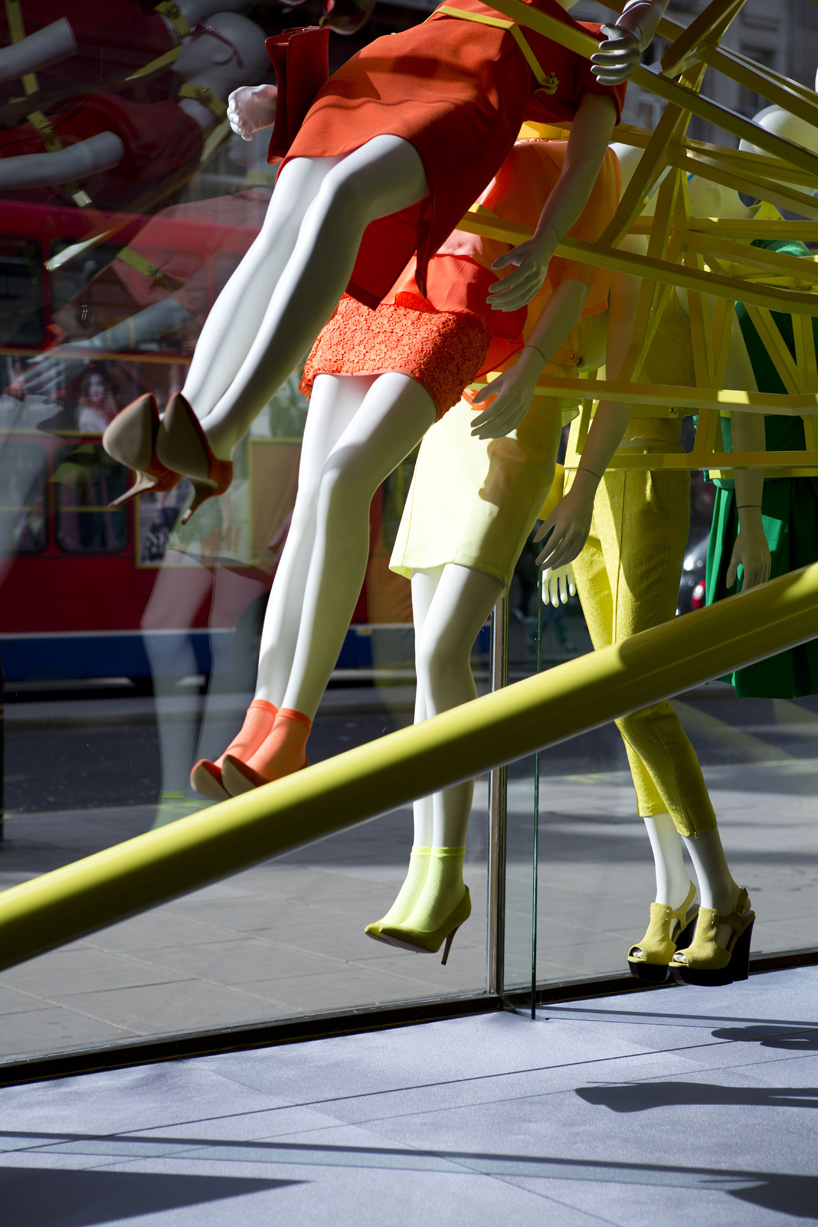 NEON architects: riba colour mannequin wheel installation