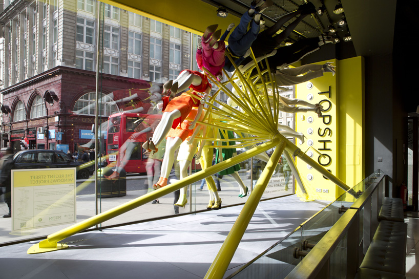 NEON architects: riba colour mannequin wheel installation