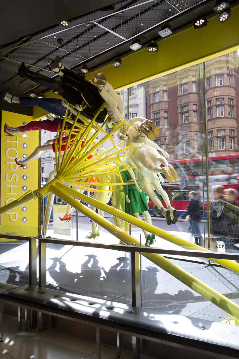 NEON architects: riba colour mannequin wheel installation