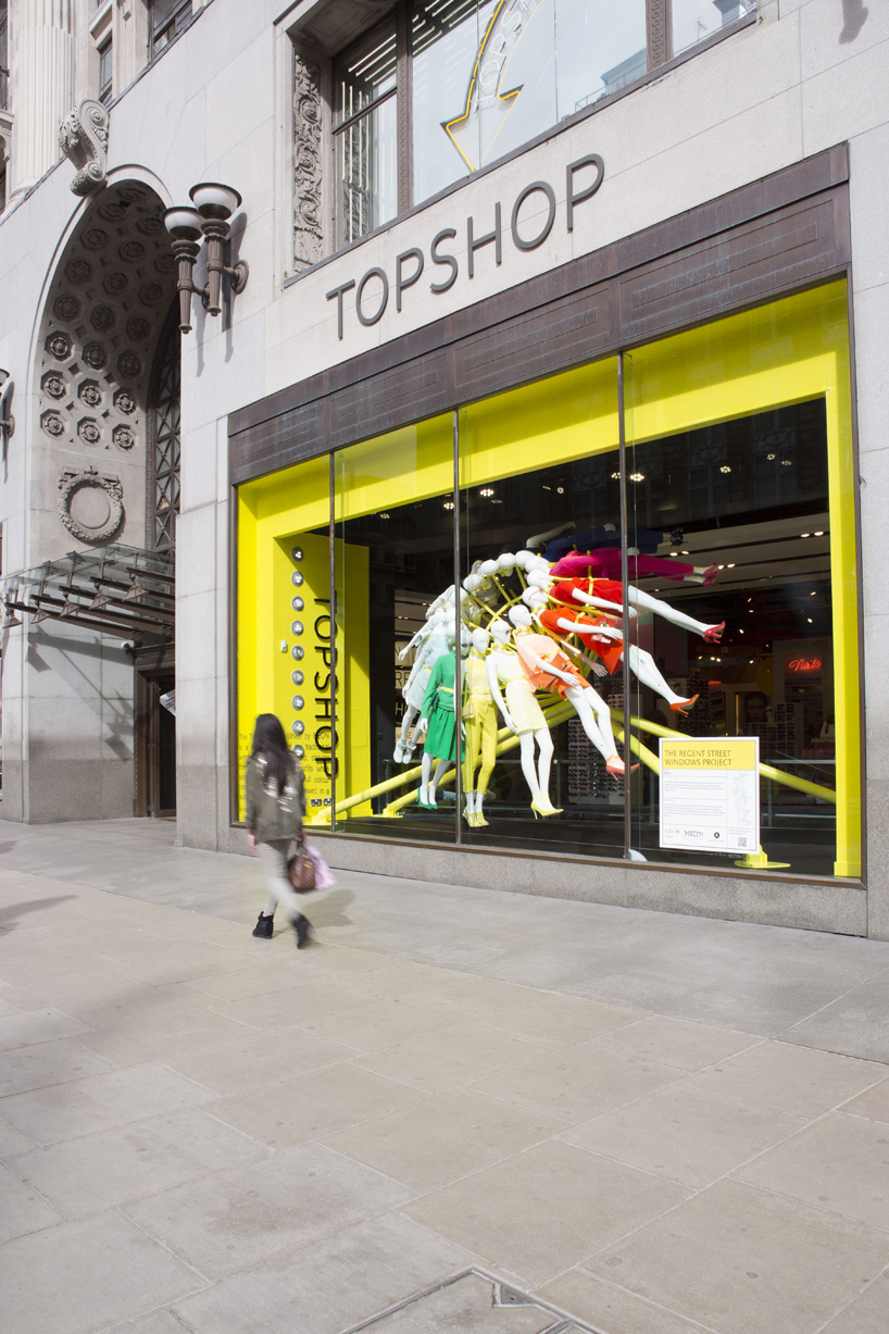 NEON architects: riba colour mannequin wheel installation