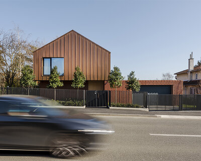 MVA architects wraps a textured brick wall around courtyard house in zagreb