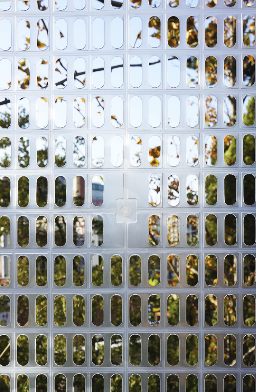 hyunje joo engulfs 1,500 semi-transparent baskets on building façade in korea
