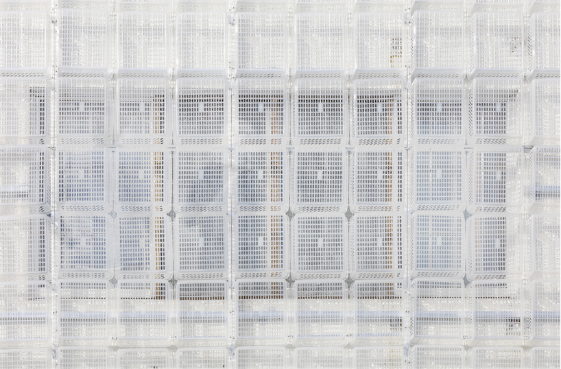 hyunje joo engulfs 1,500 semi-transparent baskets on building façade in korea