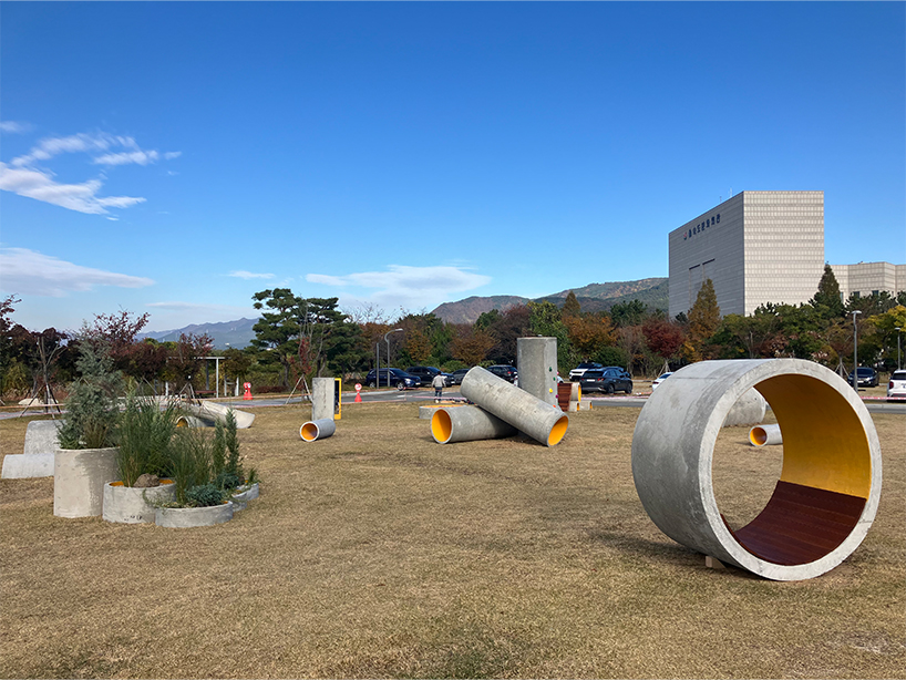 concrete utopia transforms discarded construction pipes into playground in south korea