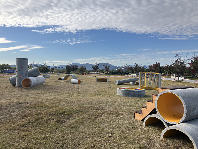 concrete utopia transforms discarded construction pipes into playground in south korea