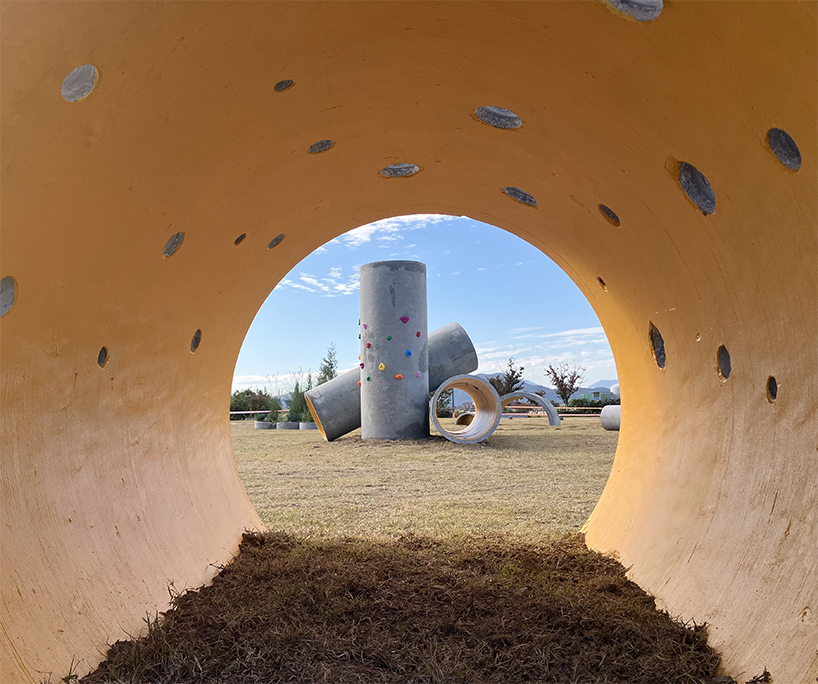 concrete utopia transforms discarded construction pipes into playground in south korea