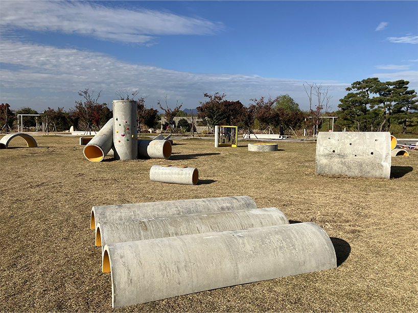 concrete utopia transforms discarded construction pipes into playground in south korea