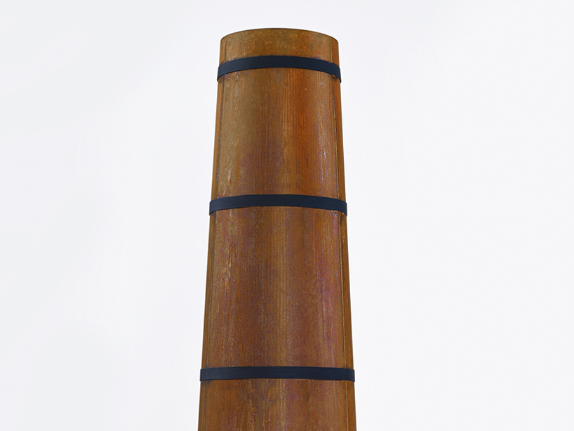 burning smokestack garden heater by frederik roije