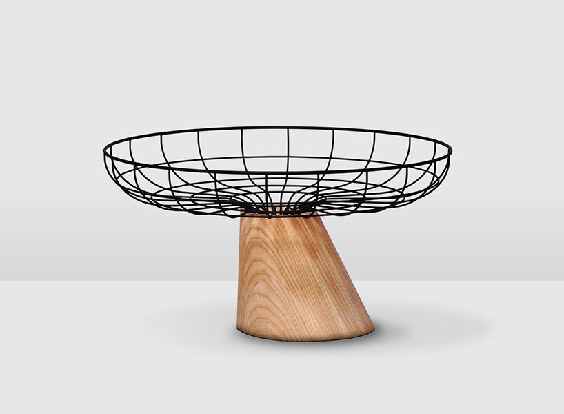 cutting edge chair and leaning fruit bowl by studio 248