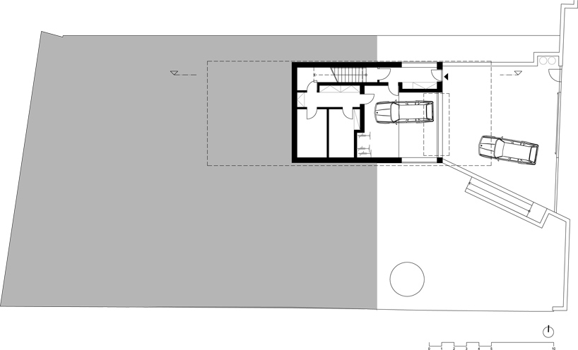 sloped semi cantilever house by grido architektura