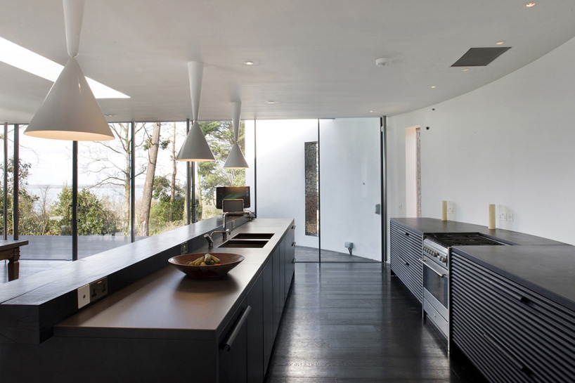 glass house by manser practice architects