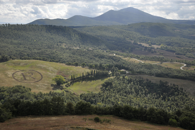 giuseppe licari cuts registered trademark into the tuscan countryside