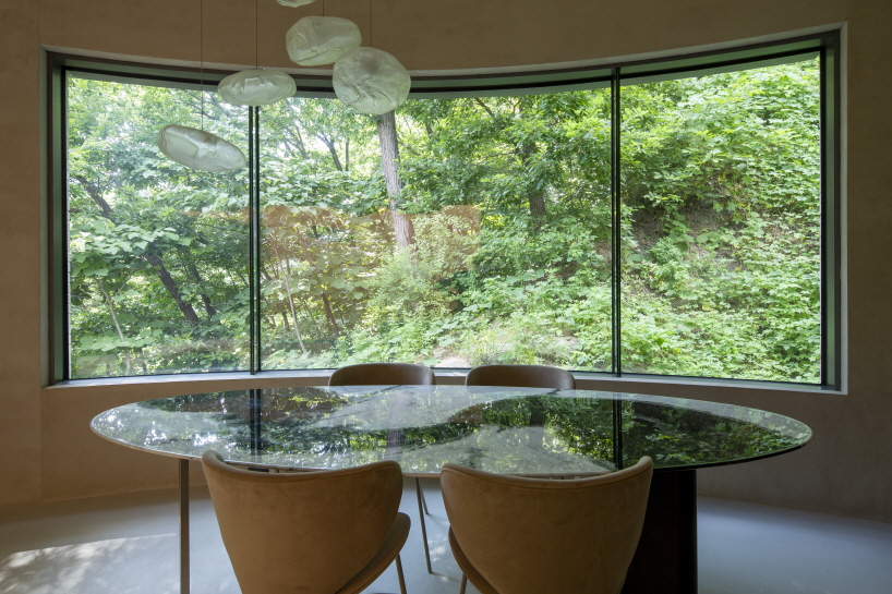 two intersecting circles shape snow AIDe's house in woodlands near seoul 