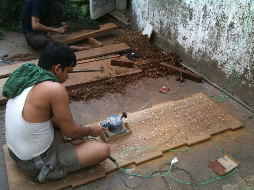 inlayed teak room partition by rooshad shroff