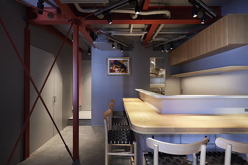 old steel-framed house converts into vibrant restaurant in tokyo