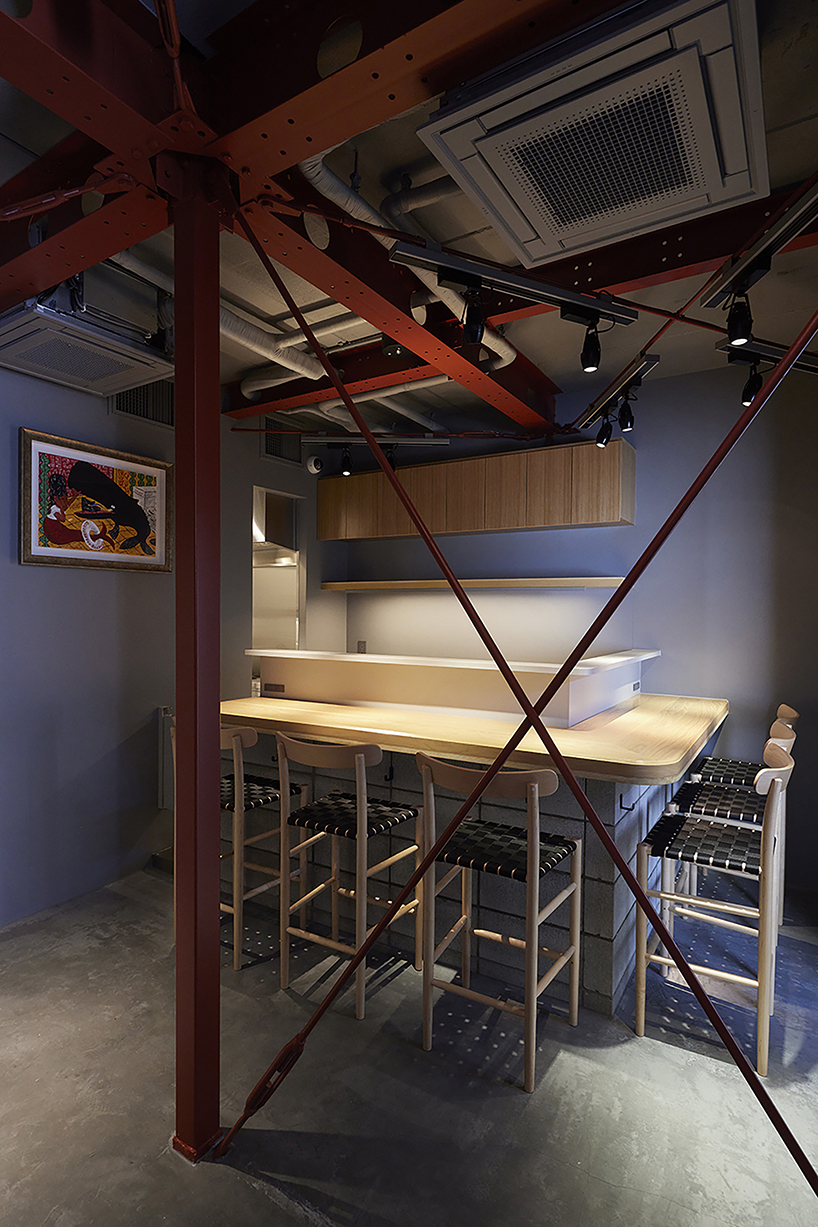 old steel-framed house converts into vibrant restaurant in tokyo